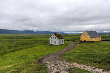 vibrant farmlands and grey skies