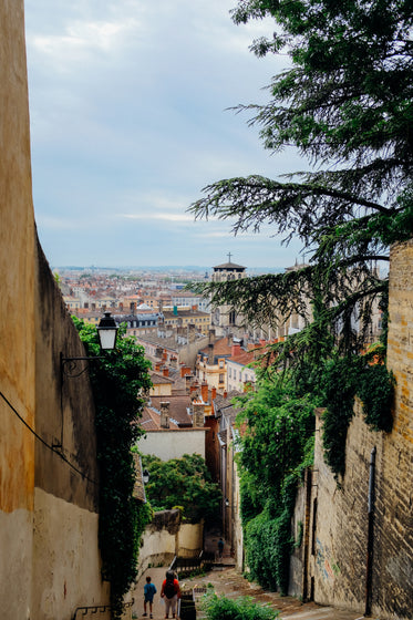 view of a city from the top of a high staircase