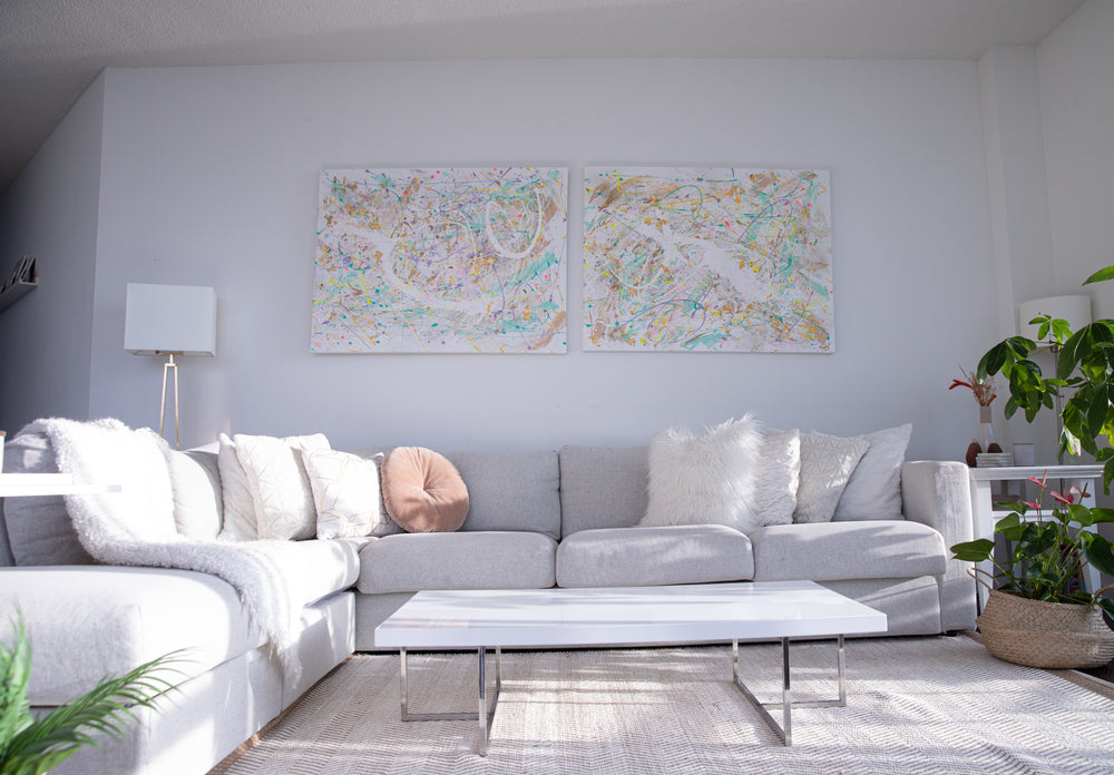 view of a tidy living room with a grey sectional