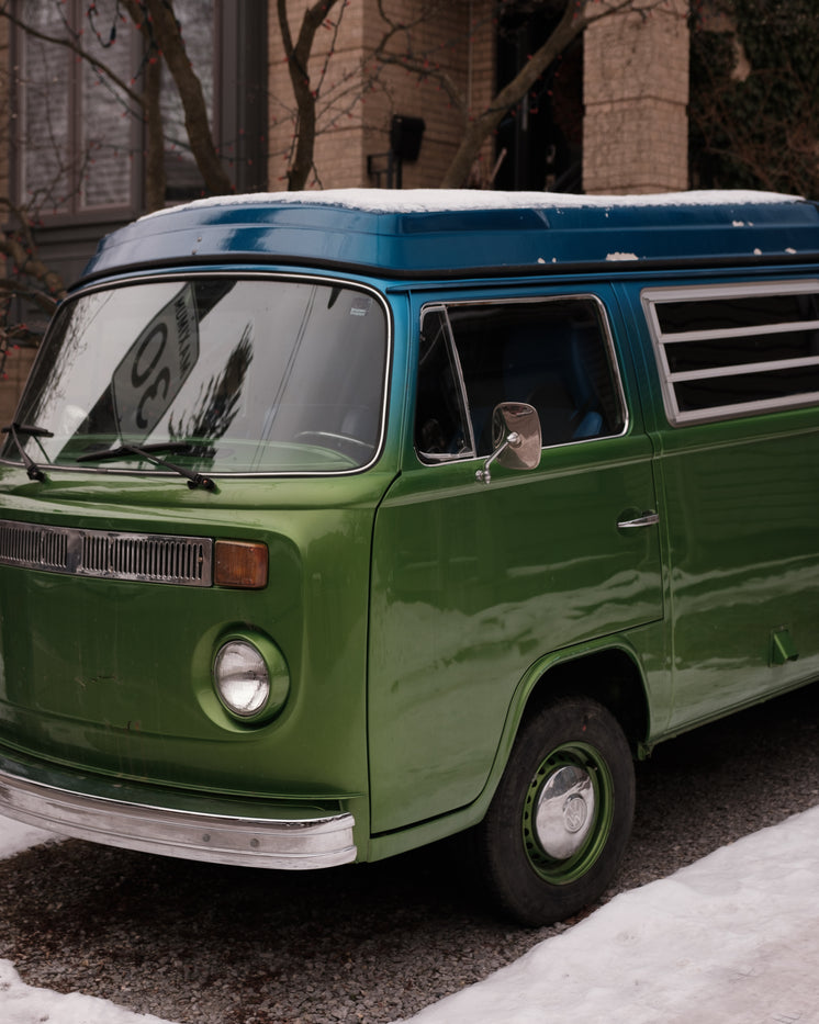 vintage-blue-and-green-camper-van-parked