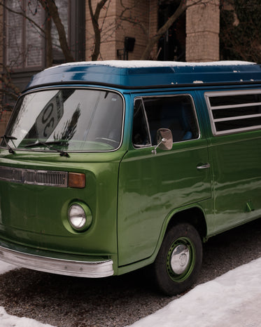 vintage blue and green camper van parked
