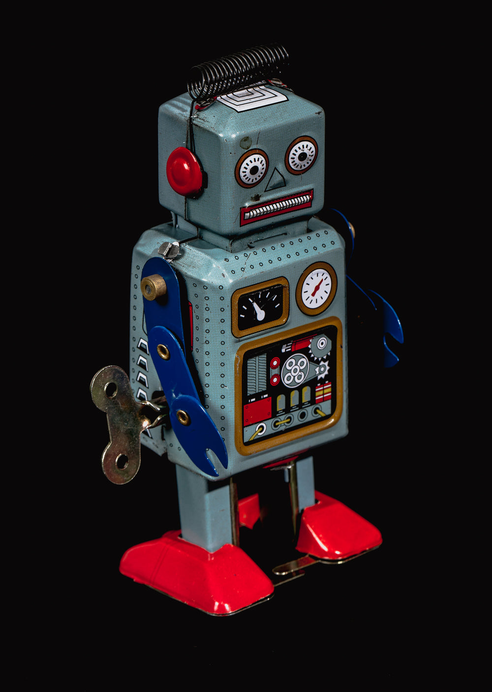 vintage robot black background portrait