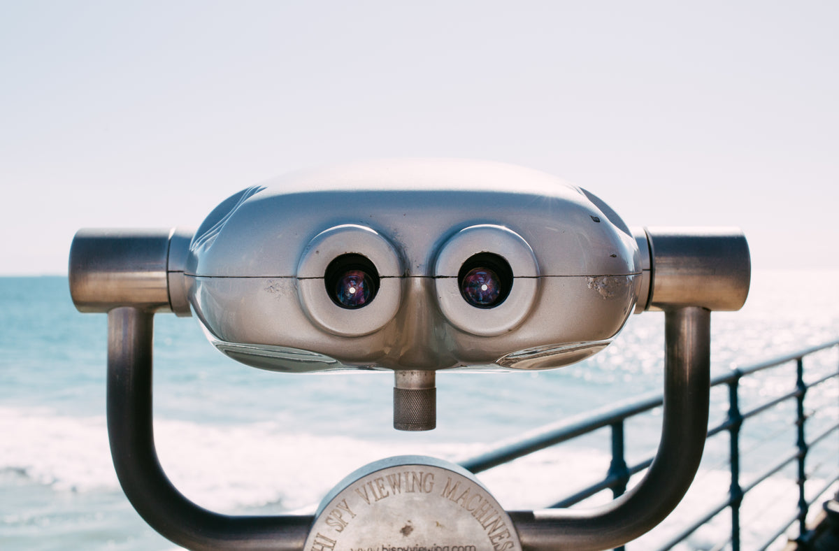 vintage viewfinder on seaside pier