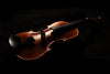 violin in dramatic lighting