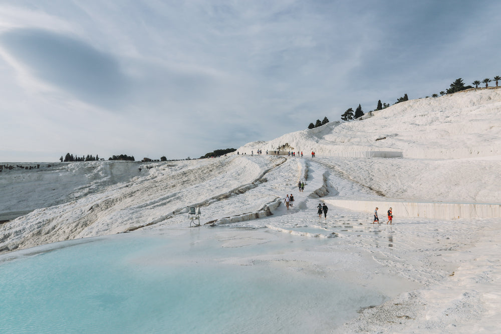 visitors explore thermal pools