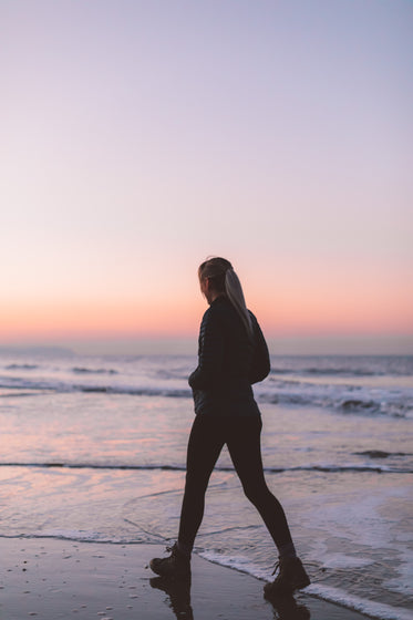 walking beside cool beach waves