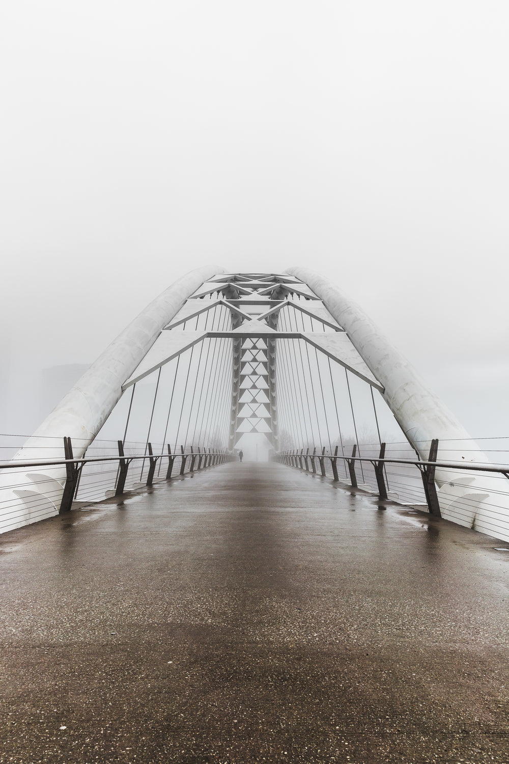 walking bridge on grey day