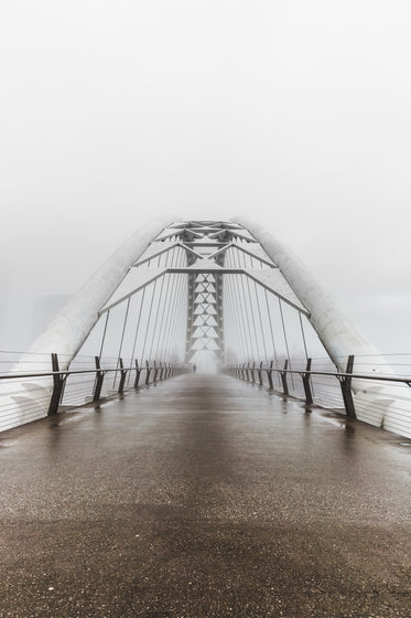 walking bridge on grey day