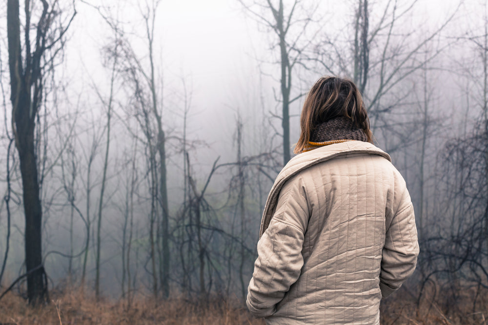 walking in foggy woods