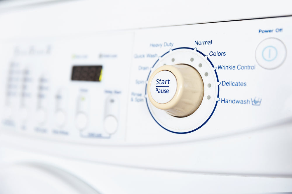 washing machine start button