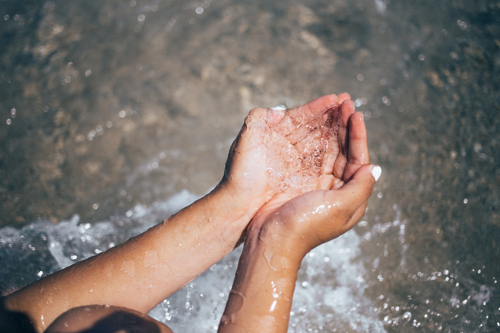 water in hand