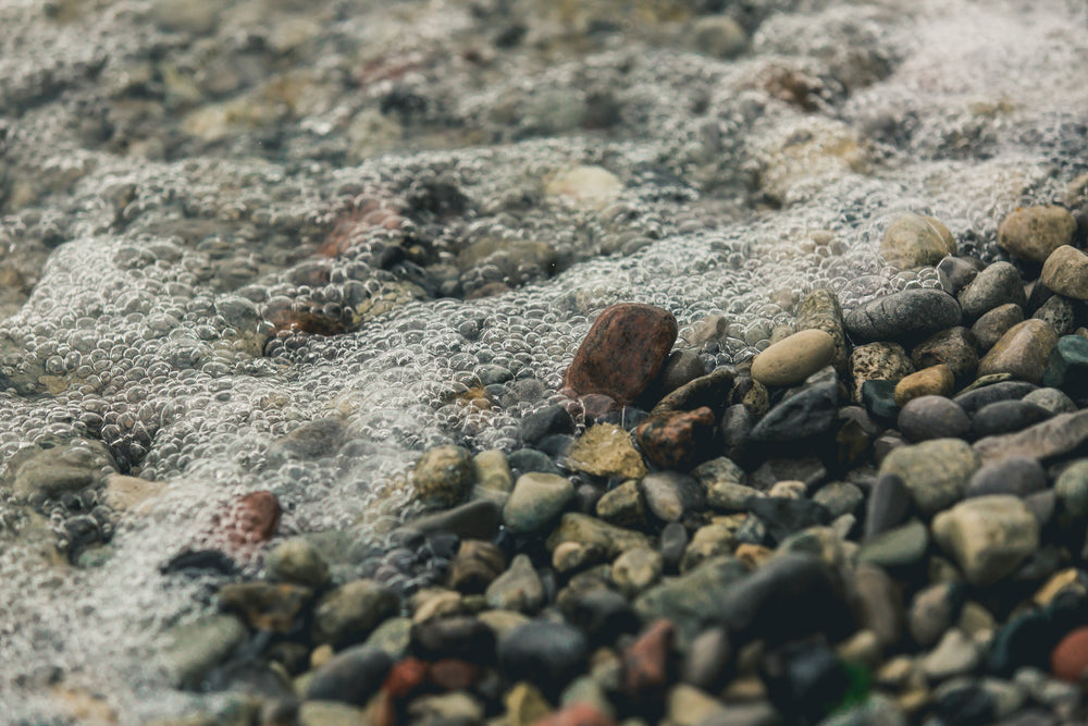 water on rocky beach