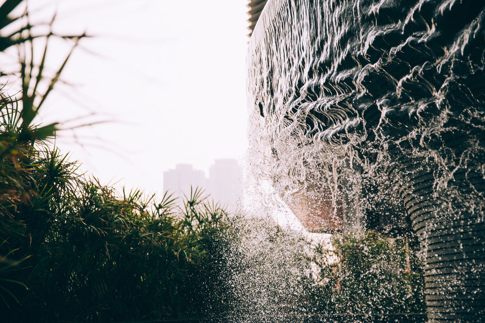 water ripples down the side of a fountain