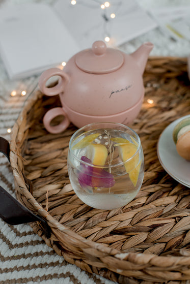 water with lemon and flower petals