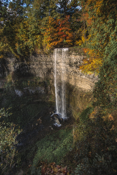 waterfall over canadian escarpment in fall