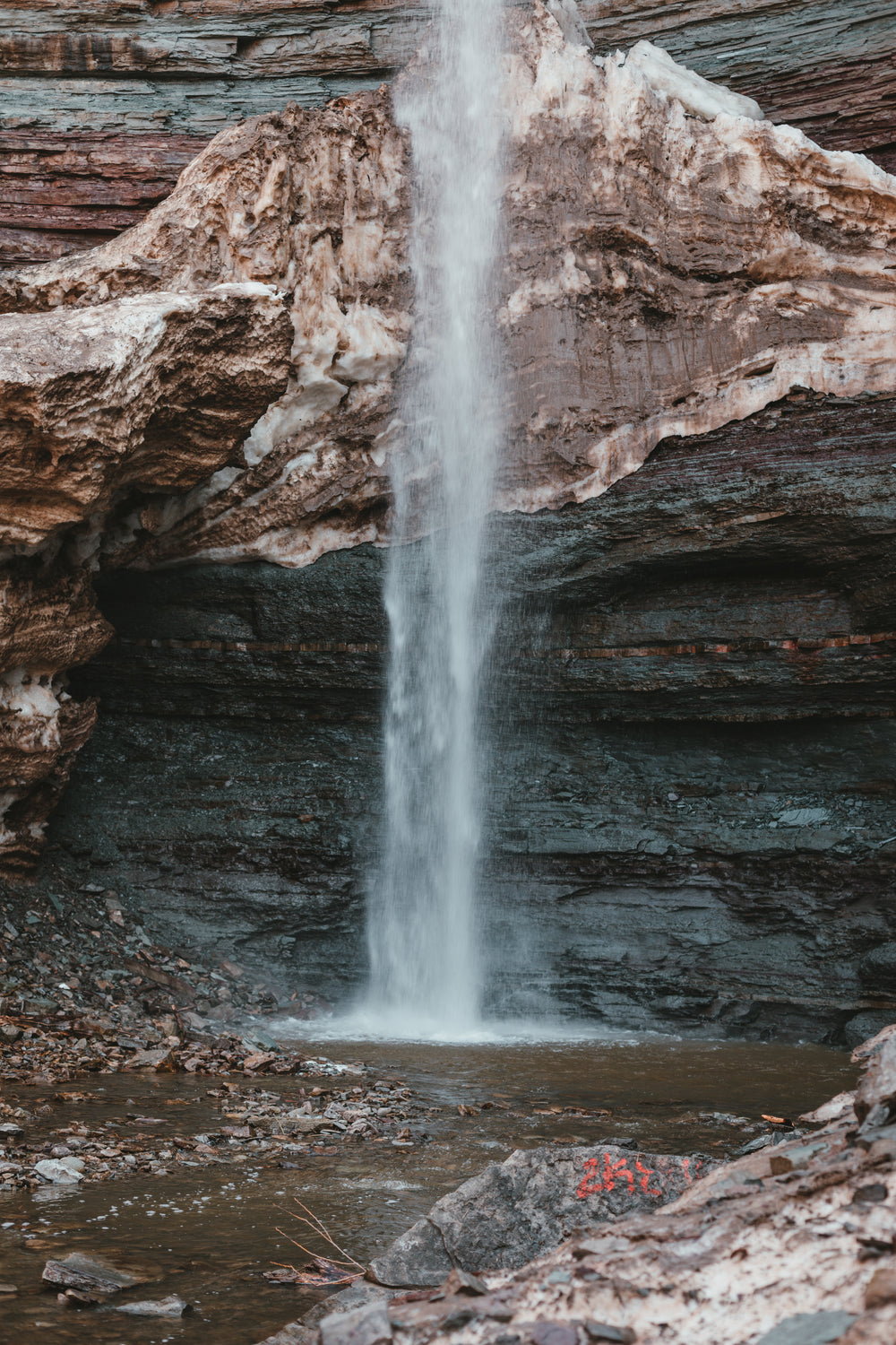 waterfall over rock face