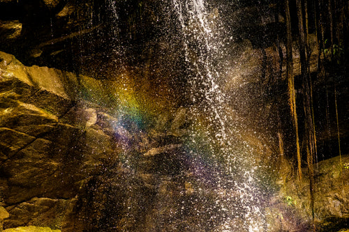 waterfall refracting rainbow
