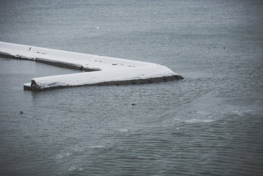 Browse Free HD Images of Wave Breaker Covered In Snow