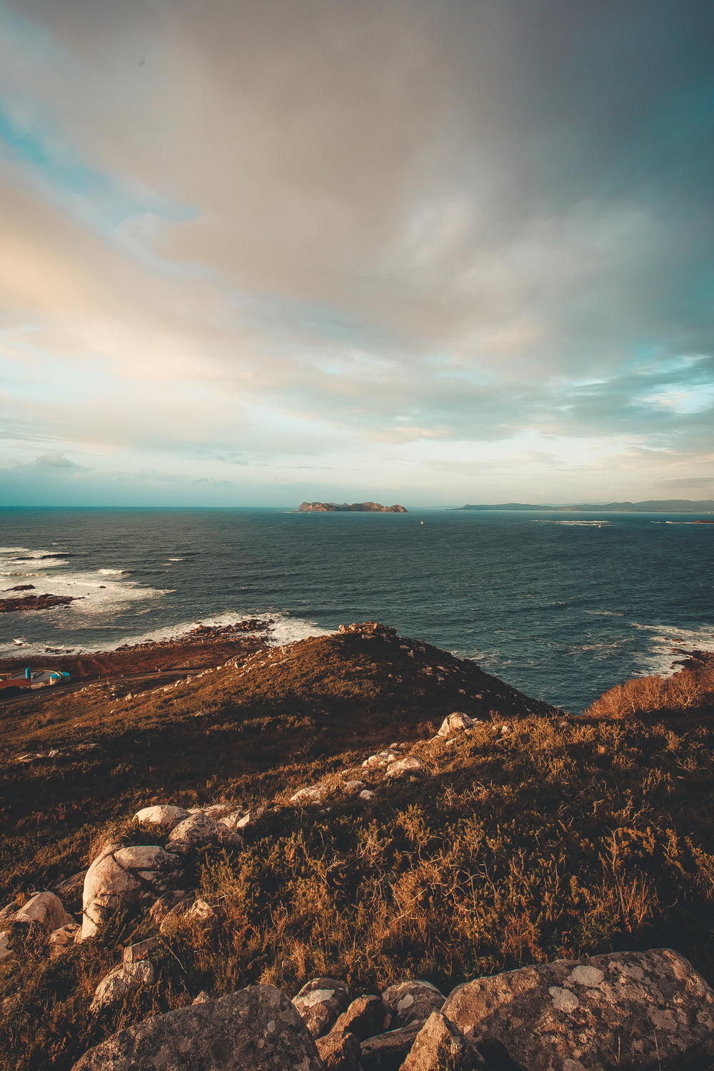 waves crash against rocky shore