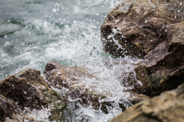 waves crashing on rock