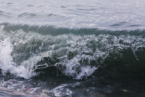 waves crashing on shoreline