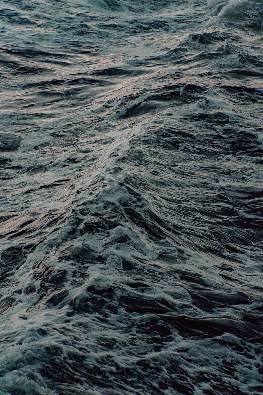 Browse Free HD Images of Waves Moving Through The Ocean At Dusk