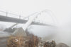 white bridge in fog