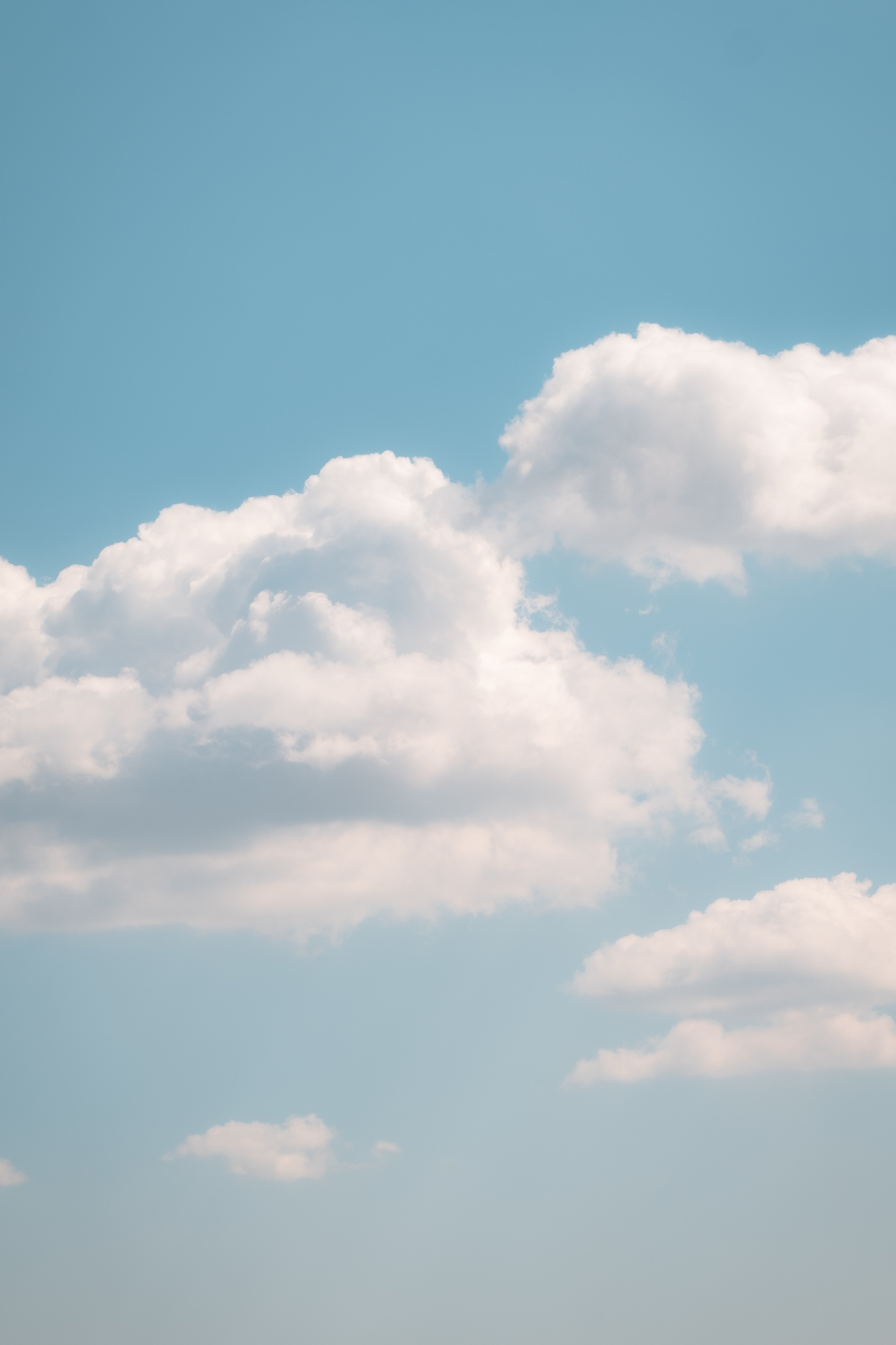 Browse Free HD Images of White Clouds In A Soft Blue Sky On Warm