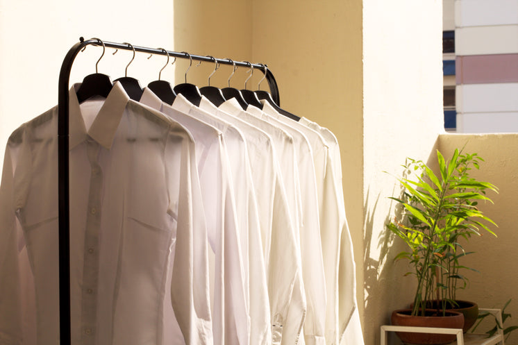 White Collar Shirts On Rack In Sun