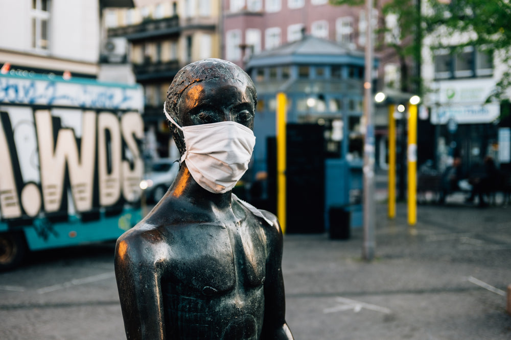 white mask on a statue