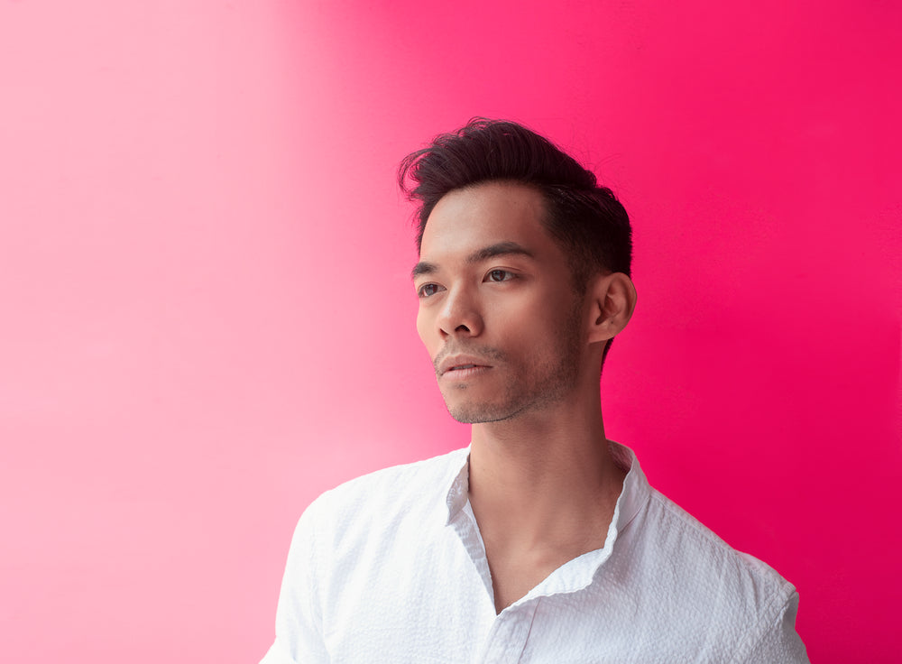 white shirt pink wall