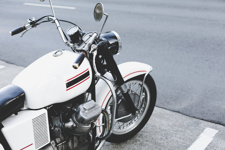 white-striped-motorcycle.jpg?width=746&f