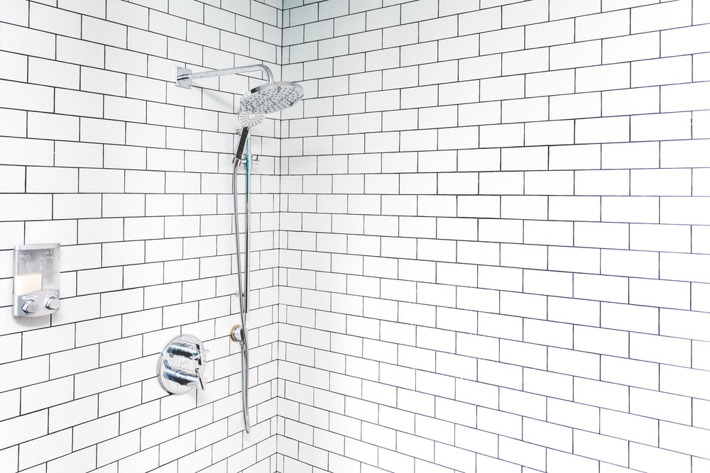 white tile shower corner