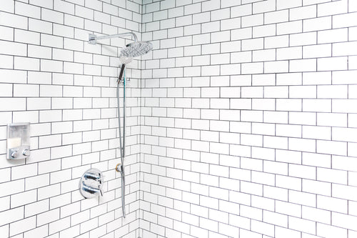 white tile shower corner