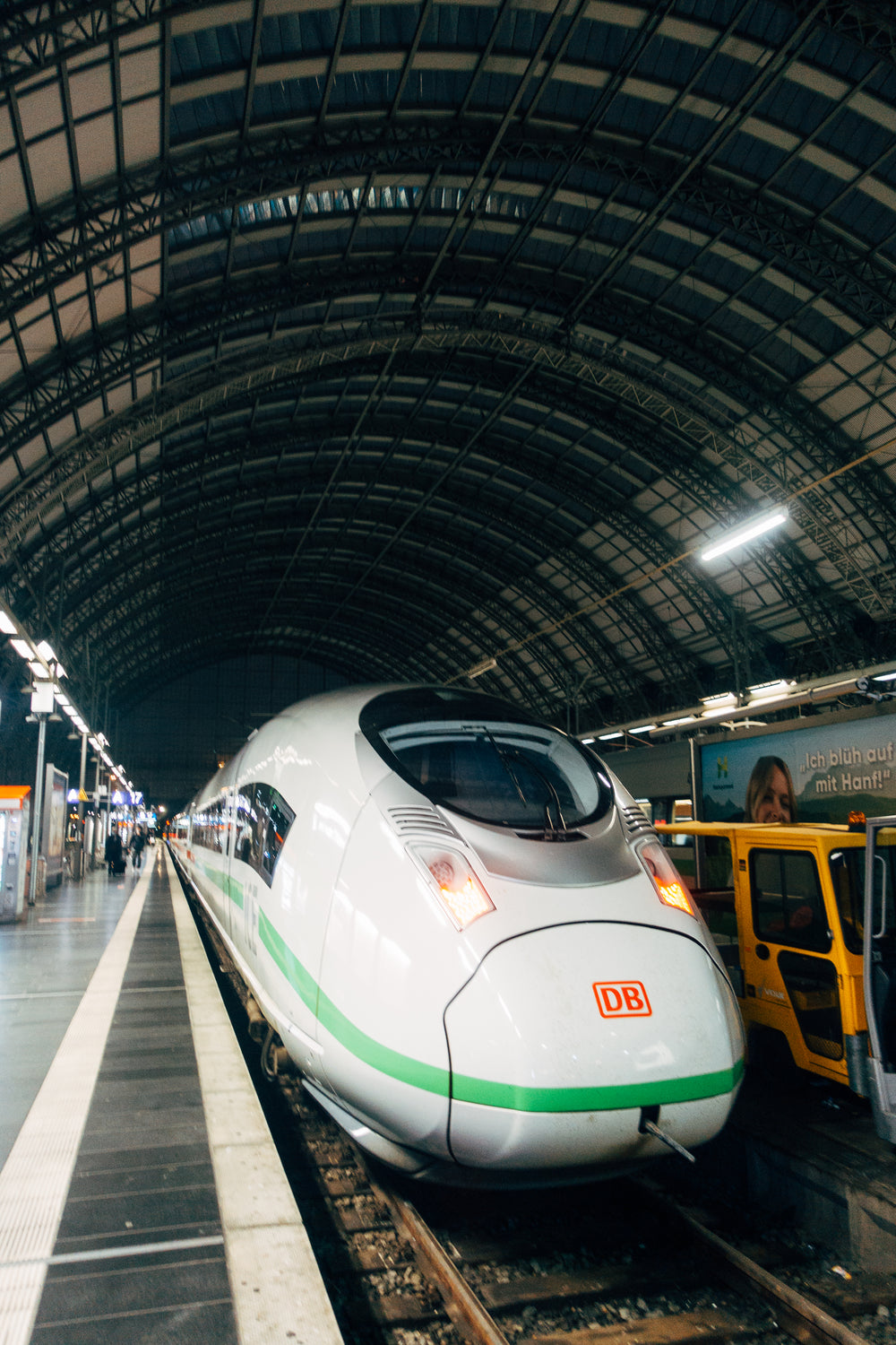 white train stopped at station