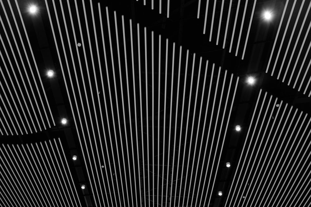 white vertical lines on a black ceiling