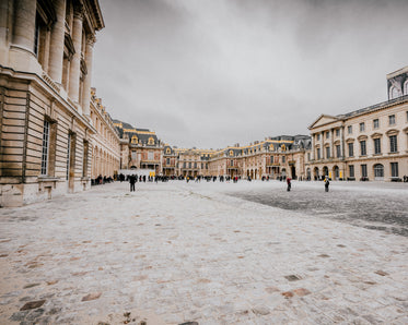 wide exterior shot of the palace of versailles