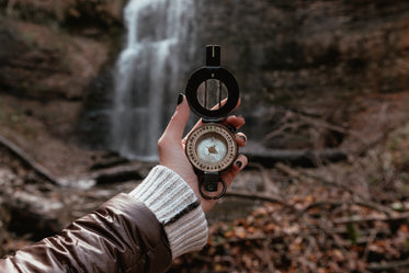 wide shot of compass and waterfalls