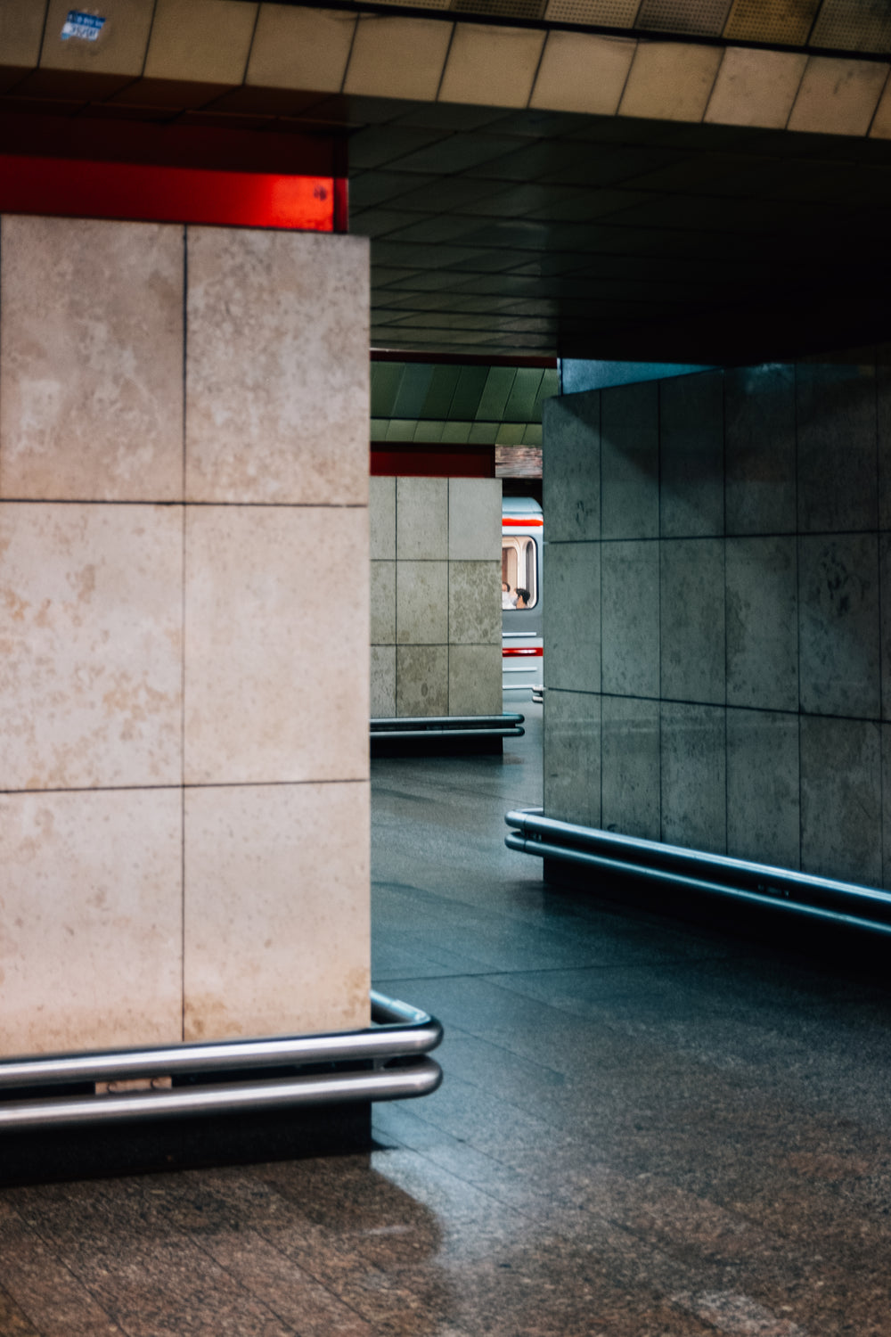 winding hallway inside a public transit building