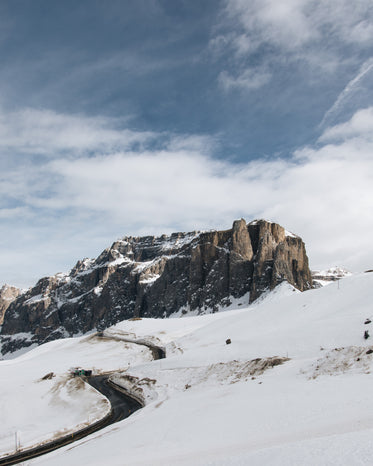 winding road to a mountain peak