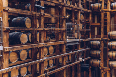 wine barrels in wooden structure