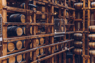 wine barrels in wooden structure