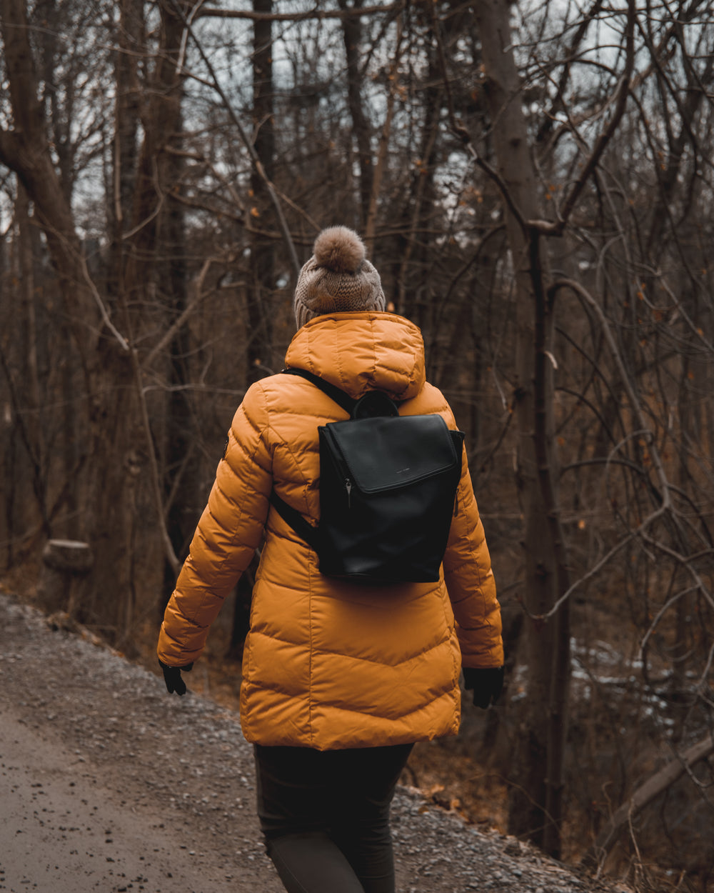 winter walks in yellow puffer jacket