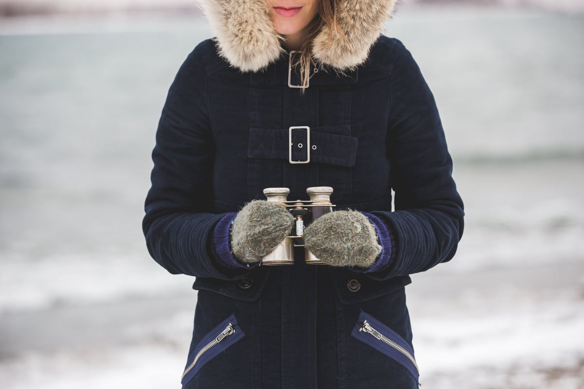 winter woman with binoculars