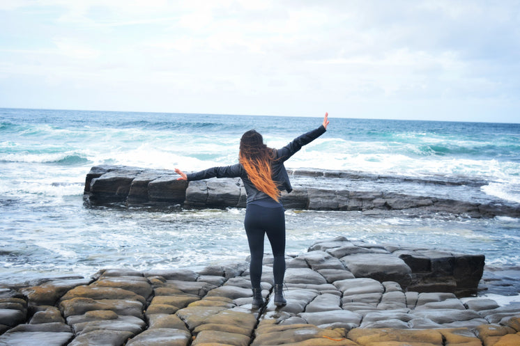 woman-by-ocean-arms-open.jpg?width=746&format=pjpg&exif=0&iptc=0