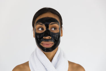 Woman With Charcoal Face Mask