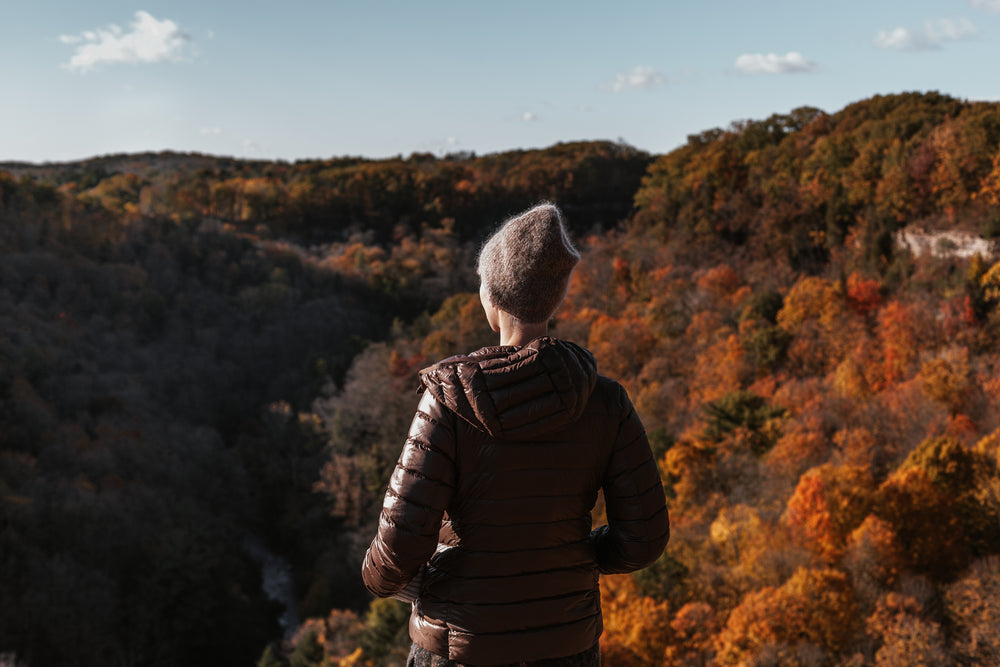 woman enjoys the autumn views