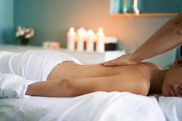 Free Stock Photo of Woman Getting Back Massage — HD Images
