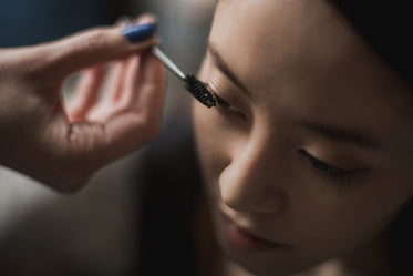 woman getting mascara makeup