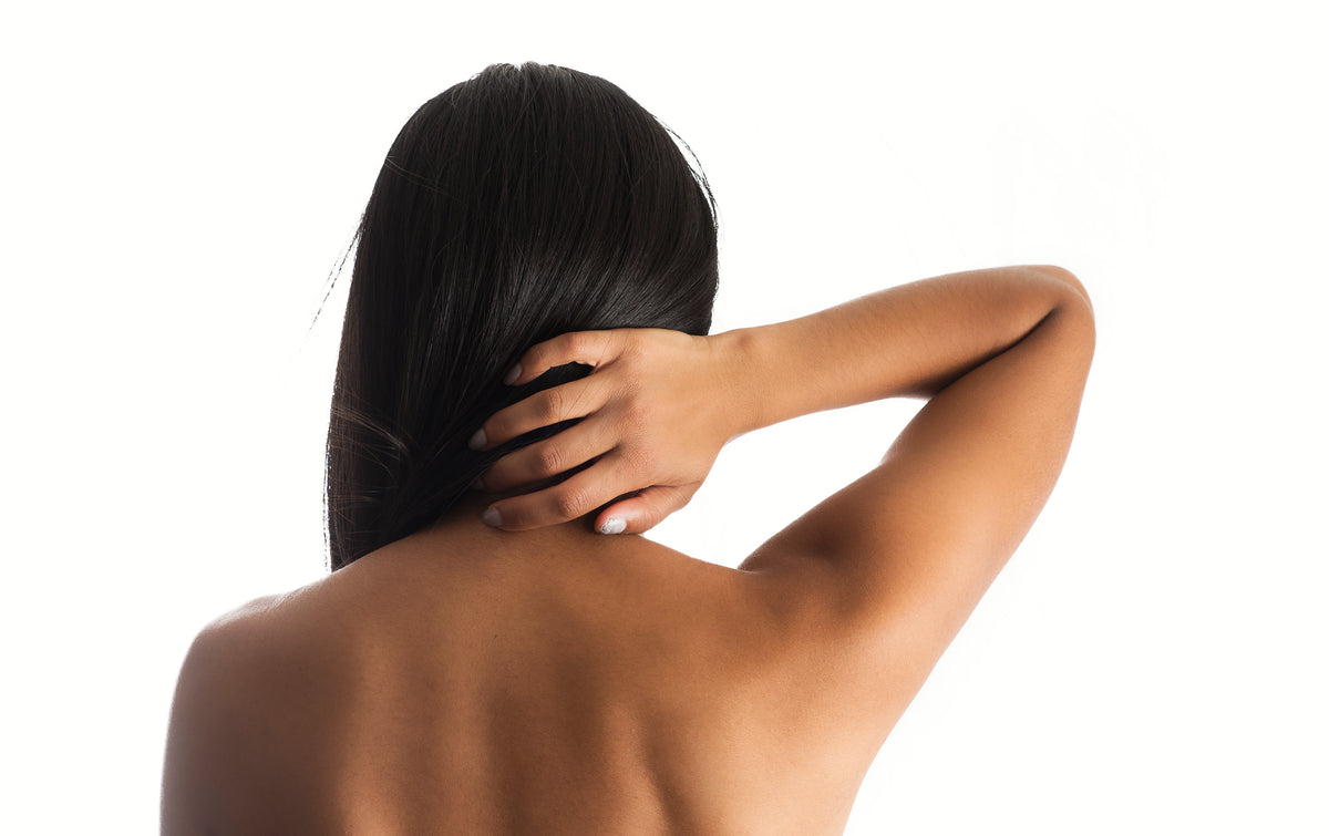 woman hand on back neck